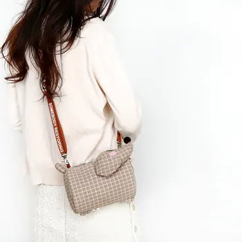 

Niche designer brand art Japanese mobile phone package Sen department small fresh small bag fun Messenger bag mobile phone bag