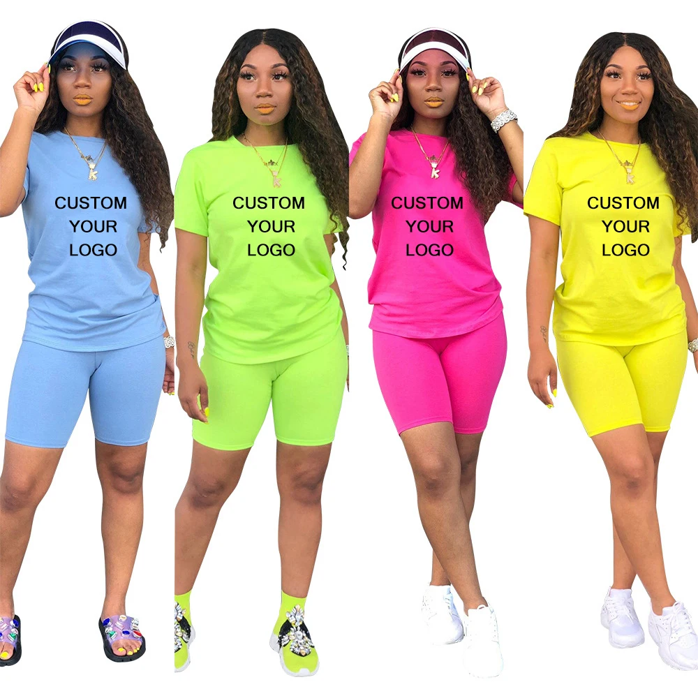 

Women's two-piece solid color clothing neck t-shirt with short sleeves and tight shorts. Customize your logoTracksuit Outfit