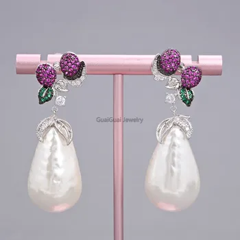 

GG Jewelry Teardrop White Sea Shell Pearl Cz Pave Earrings