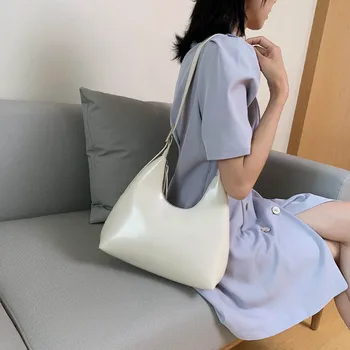 

Korean fashion casual one-shoulder armpit bag women bag 2020 summer new texture foreign niche crescent solid color bag