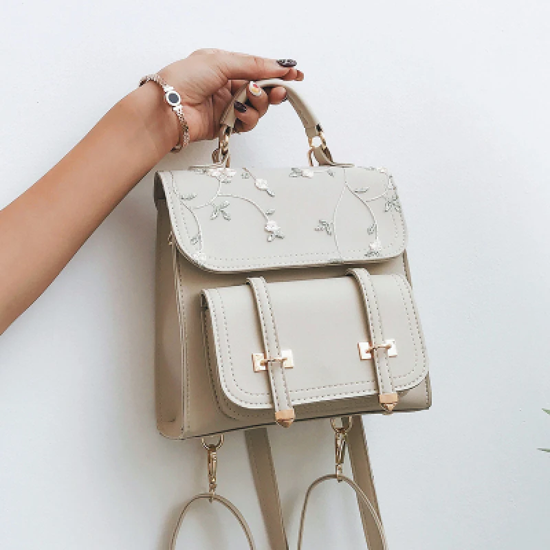 Nueva inclusión de verano fresco pequeño bordado de flores mochila estudiante mochila mini niña pequeña mochila, mochila de viaje