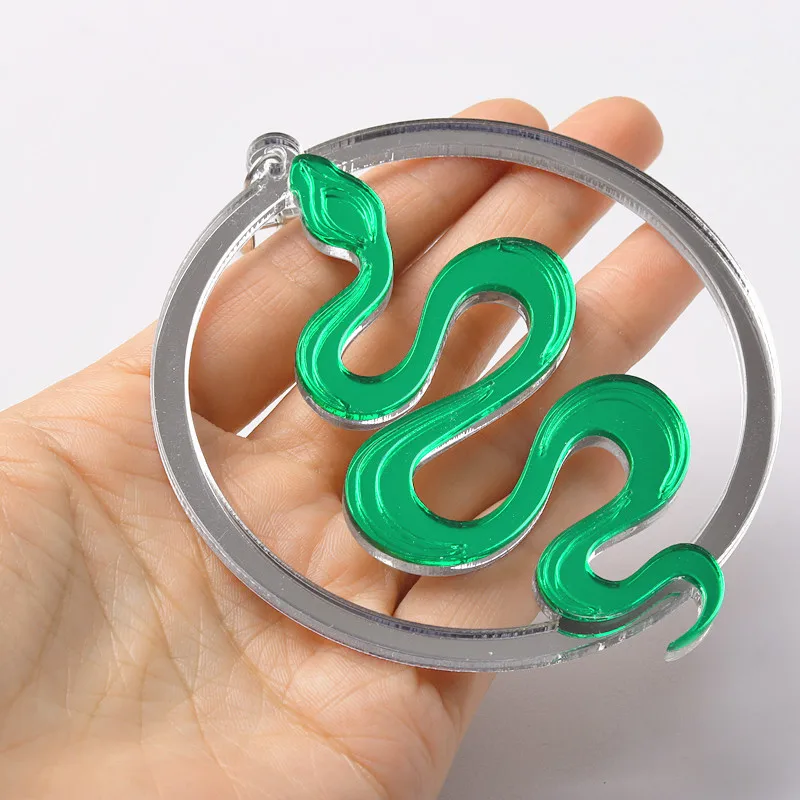 Orecchini a cerchio Huggies a forma di serpente d'oro di lusso per le donne alla