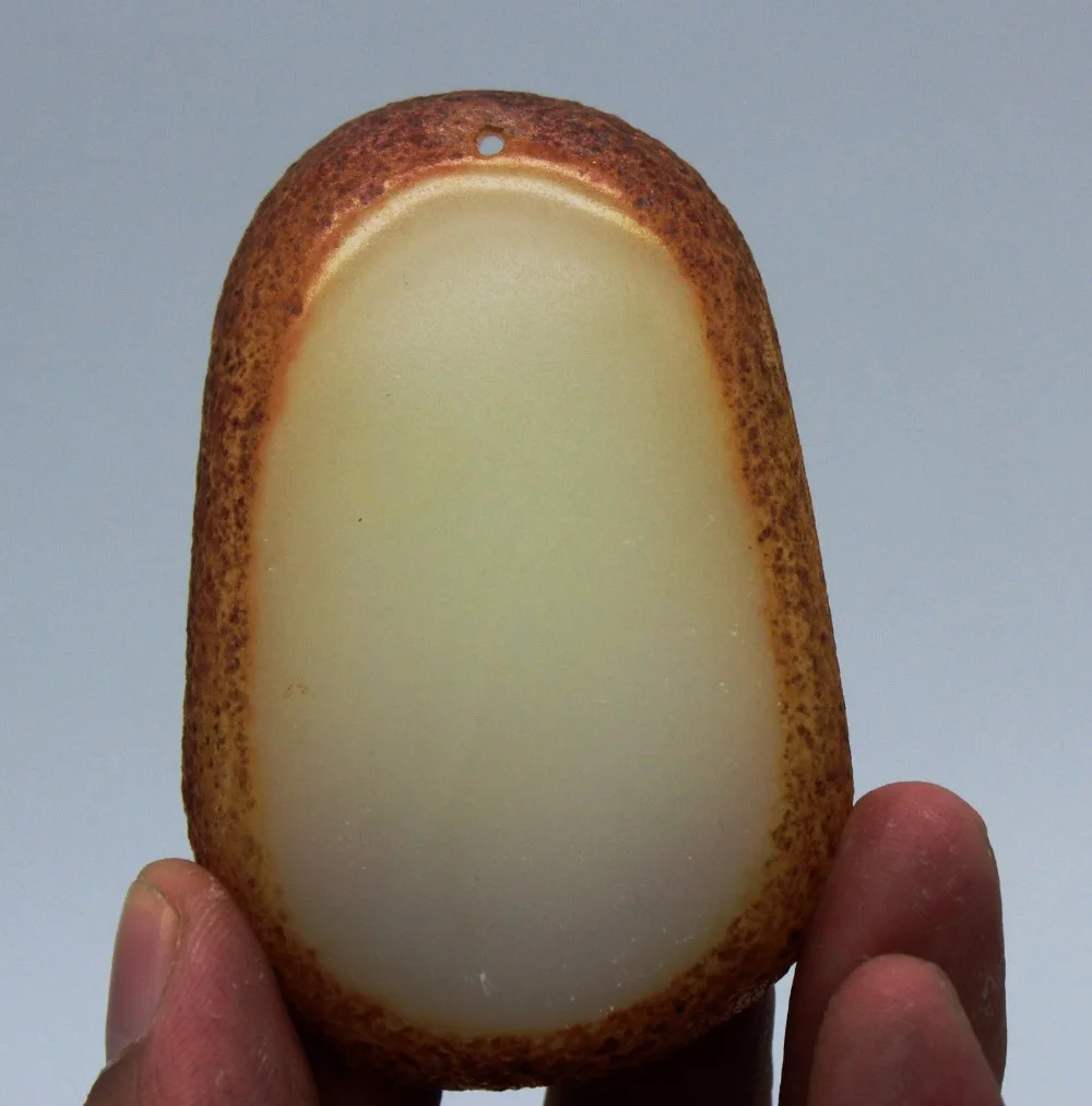 

China Xinjiang natural Special grade Hetian Jade Seed material Guanyin Pendant
