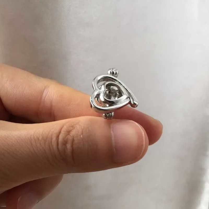 

18kgp Heart Shape Ring Can Open & Put In 7 MM Bead Cage Ring Fitting Adjustable Size