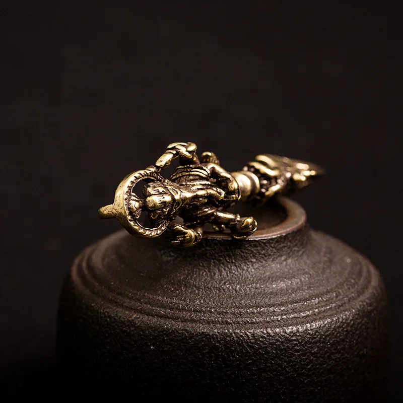brass vajry charms (3)