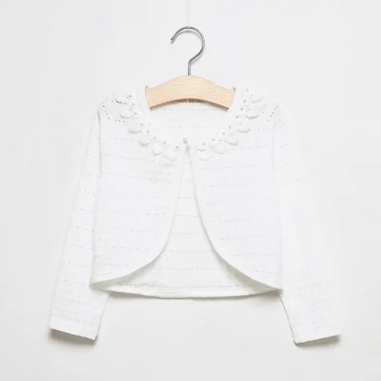 white shrug sweater