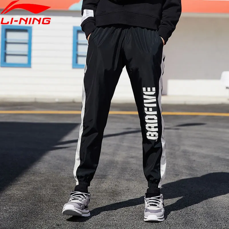 Женские баскетбольные штаны Li-Ning BAD FIVE свободные спортивные из полиэстера с