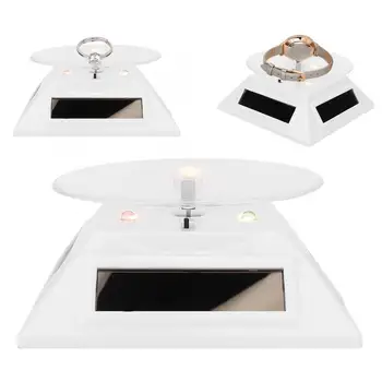 

Portable Electric LED Light Solar Powered Rotating Turntable Display Stand for Jewelry Phone Watches Camera Box for Jewelry y