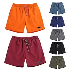 Short de jogging avec poche pour homme, pantalon de travail, décontracté, respirant, de plage, de Sport, de couleur unie 