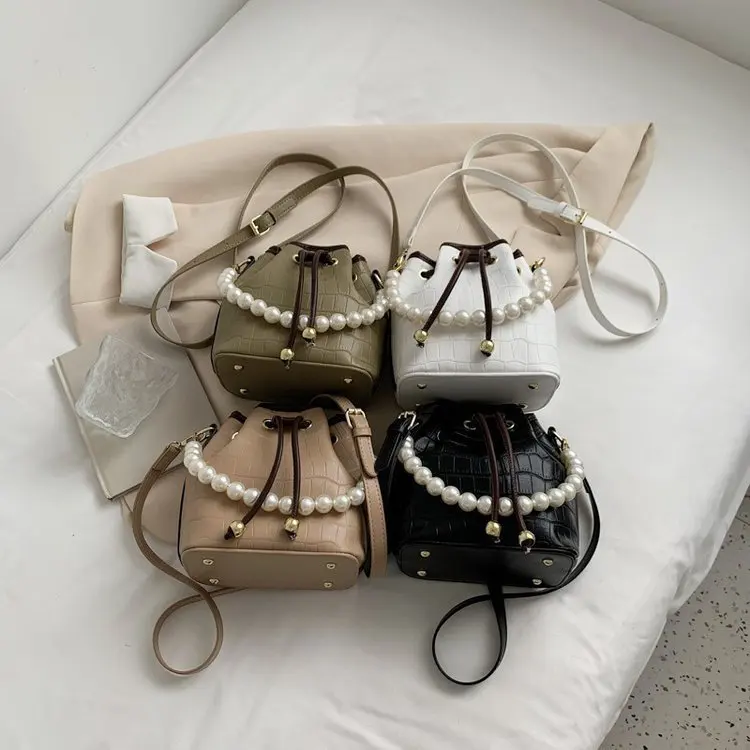 

2021 new ladies fashion shoulder bag simple pearl drawstring bucket bag messenger bag mobile phone bag