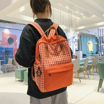 

Canvas schoolbag female Korean college student campus simple Mori vintage sense girl plaid backpack