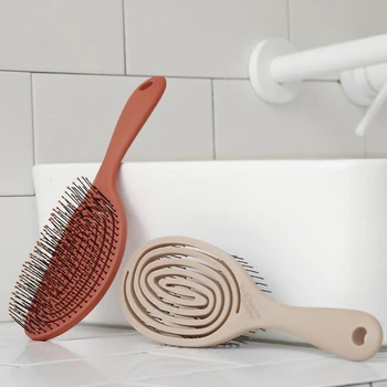 

Comfortable elastic massage comb portable comb massage comb magic comb