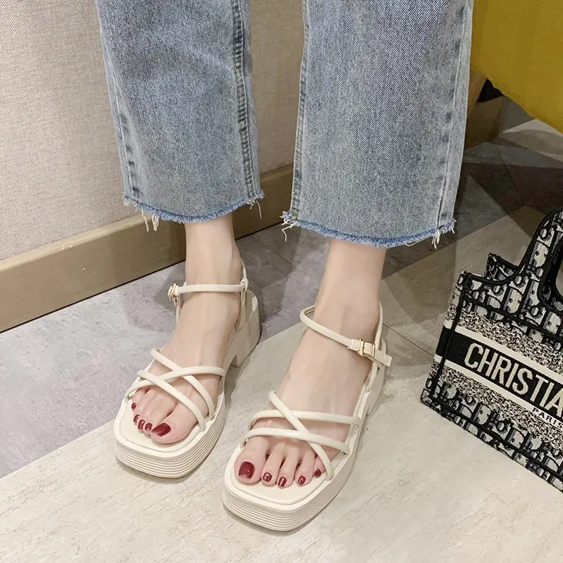 

2020 summer new wild fairy wind with thick heel Roman sandals muffin bottom sandals female simple fashion wild sandals Z967