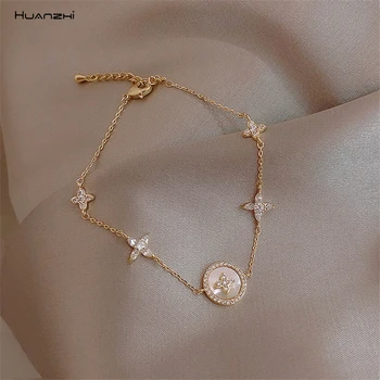 

HUANZHI 2020 New Cubic Zirconia Natural Shell Stone Charm Bracelet for Woman Gold Chain Cuff Bracelet Girl Jewelry Gift