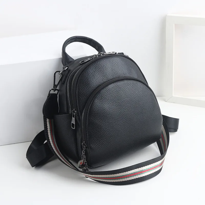 

New Korean edition layer cowhide double shoulder bag female three multi-function backpack Lady Mini hundred elliptical small