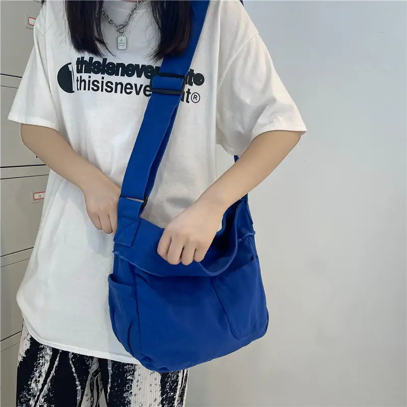 

Original Uoct.all Blue Canvas Bag Female Literary Folds Lazy Style Bag Female Messenger Bag Wild College Student Class Bag