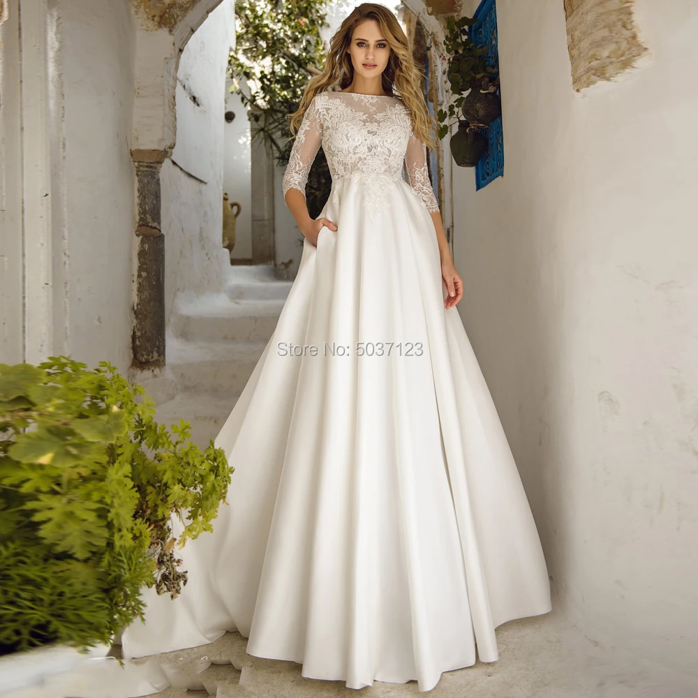 Satijn EEN Lijn Trouwjurken Drie Kwart O Hals Kant Applicaties Wedding Bruidsjurken Button Hof Trein Vestido De Noiva Satijn EEN Lijn Trouwjurken Drie Kwart O Hals Kant Applicaties Wedding Bruidsjurken Button Hof Trein Vestido De Noiva
