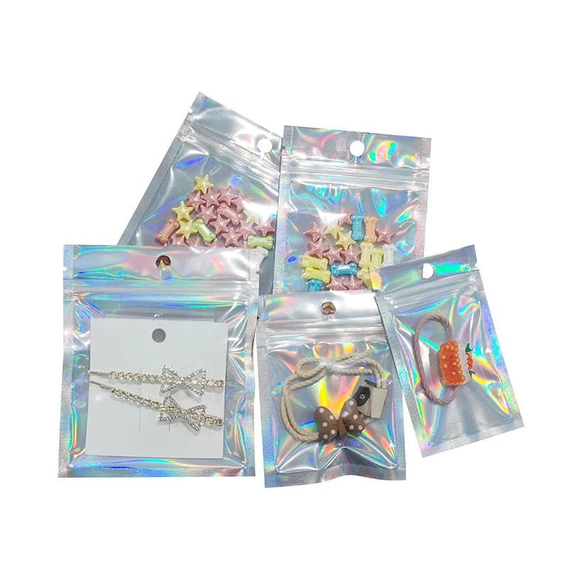 https://ae01.alicdn.com/kf/H52f3ad2ceedf4f5b911be2aa4f4e2f77T/Holographic-Gift-Logo-Custom-Printed-Bags-Aluminum-Foil-Zip-Lock-Clear-Plastic-Packaging-Mylar-Bag-For.jpg