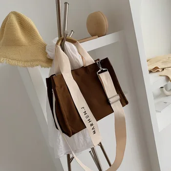 

Creative new canvas bag female casual large-capacity shoulder messenger bag letter simple Korean version of the art cloth bag