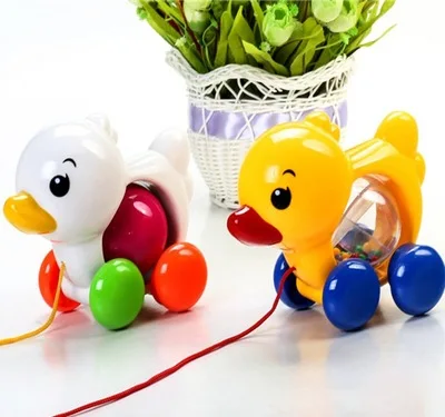 

Baby Rattles Pull Rope Duck Dog Animals Hand Jingle Shaking Bell Car Rattles Toys Music Handbell for Kids