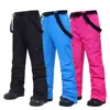 New Ski Pants Men And Women Outdoor High Quality Windproof Waterproof Ski Snowboard Pants Winter Warm Couple Snow Trousers Brand