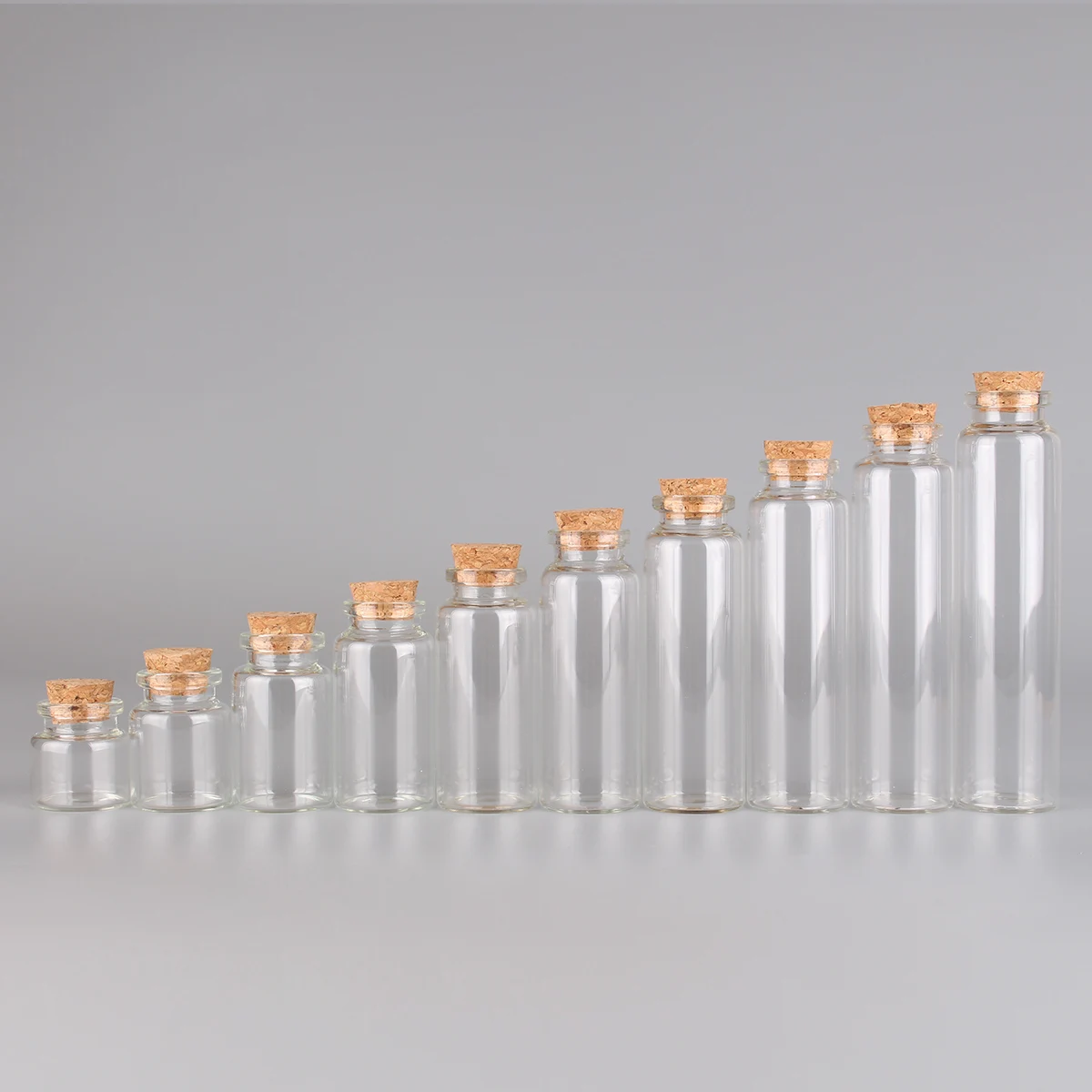 12 pieces/lot 10ml 15ml 20ml 25ml 30ml 40ml 45ml 50ml 55ml 60ml Glass Bottles With Cork Stopper Spice Jars Glass Vessels Crafts 5
