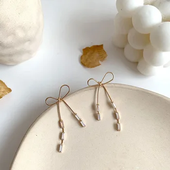 

INS Delicacy Gentle South Korea Elegant Online Celebrity Ear Stud Simple Small Diamond Set Immortal Bow Earrings Women's Silver