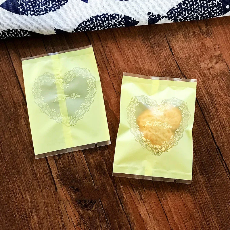 100Pcs/Lot Yellow Frosted Homemade Snowflake Crispy Nougat Wrapping Paper Heart-Shaped Lace Transparent Open Window Goodie Bags
