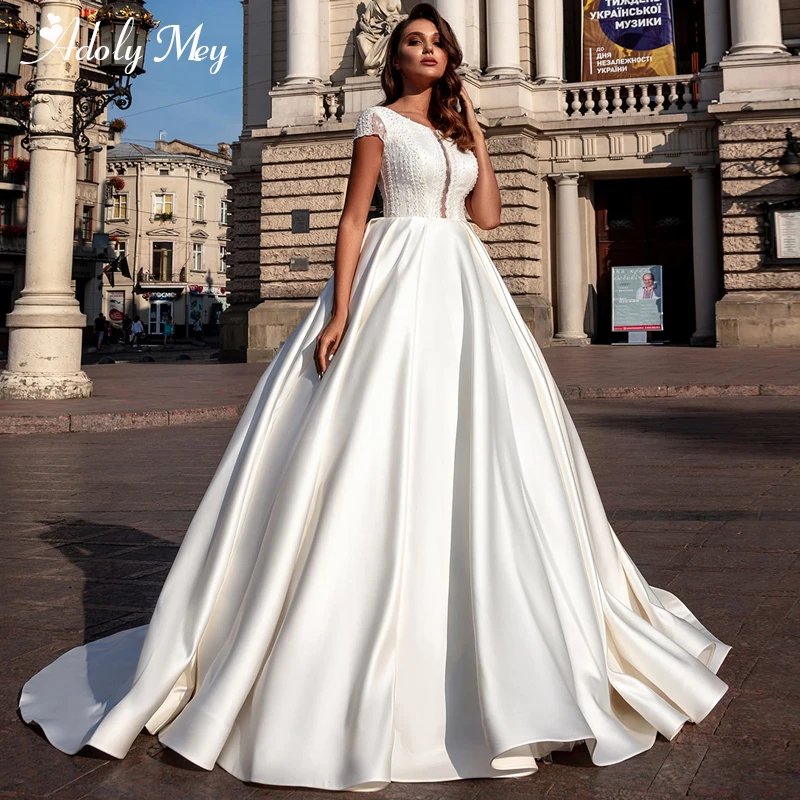 

Adoly Mey Elegant Scoop Neck Lace Up A-Line Wedding Dresses 2020 Cap Sleeve Lace Appliques Satin Court Train Vintage Bridal Gown