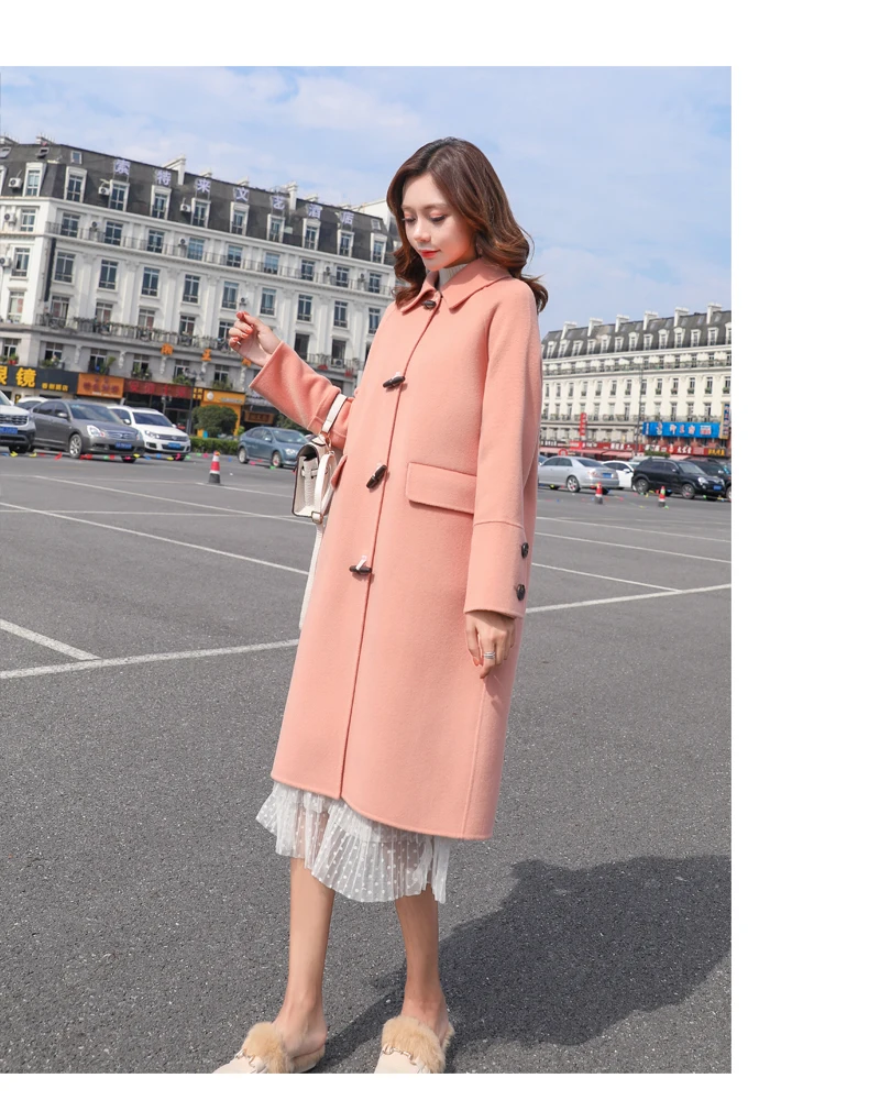 Woolen coat female long section winter new Korean version of the loose popular temperament trumpet buckle woolen