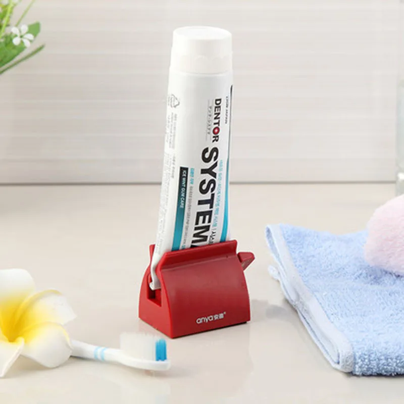 

1 Pcs Creative Toothpaste Squeezing Dispenser Rolling Tube Tooth Paste Squeezer Bathroom Supplies Toiletries bathroom decor