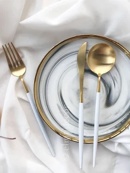 

Plates with marble pattern. Dishes with marble pattern and gold edge. Dessert, lunch, serving plate.