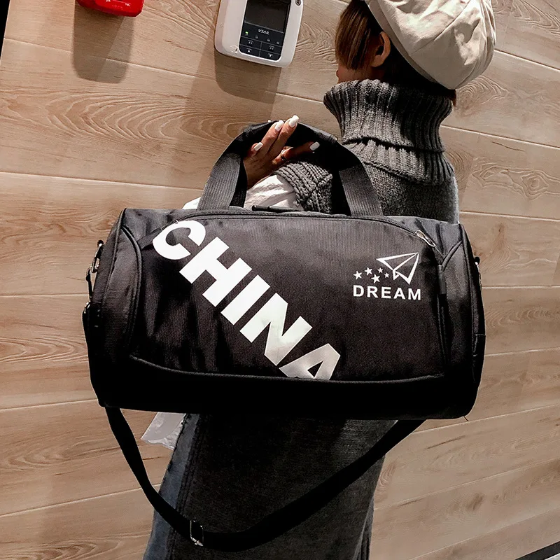 

Alphabetic Travel Bag Female Hand-held Large Capacity Travel Bag One Shoulder Korean Edition Short-distance