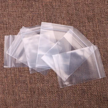 

100Pcs Plastic Bags White Grip Self Press Seal Resealable Zip Lock Clear Cookie Cake Candy Bags