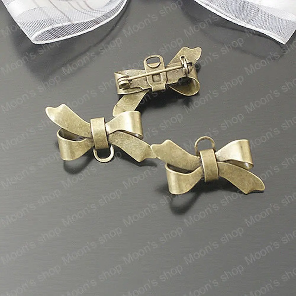 

Оптовая продажа, бронзовая брошь в античном стиле с бантом 28*17 мм, медные булавки с одним отверстием, фурнитура «сделай сам» для ювелирных изделий, аксессуары, 10 штук (JM3214)