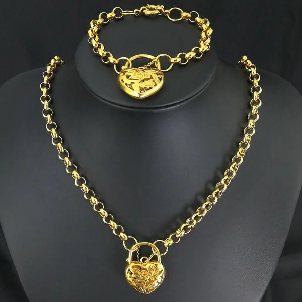 Жесткое колье с золотым сердечком 18 карат | Украшения и аксессуары