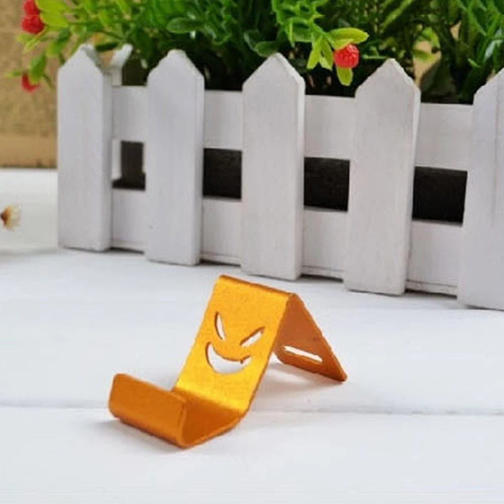 

1PC Smile Metal High Quality Smartphone Holder Universal Phone Stander Random Colors Cell Phone Holder Racks Home Organization
