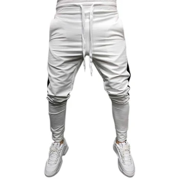 

Autumn and winter fashion men's clothing casual sports pants solid color handsome polyester waist pencil pants!