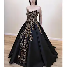 black and gold debut gown