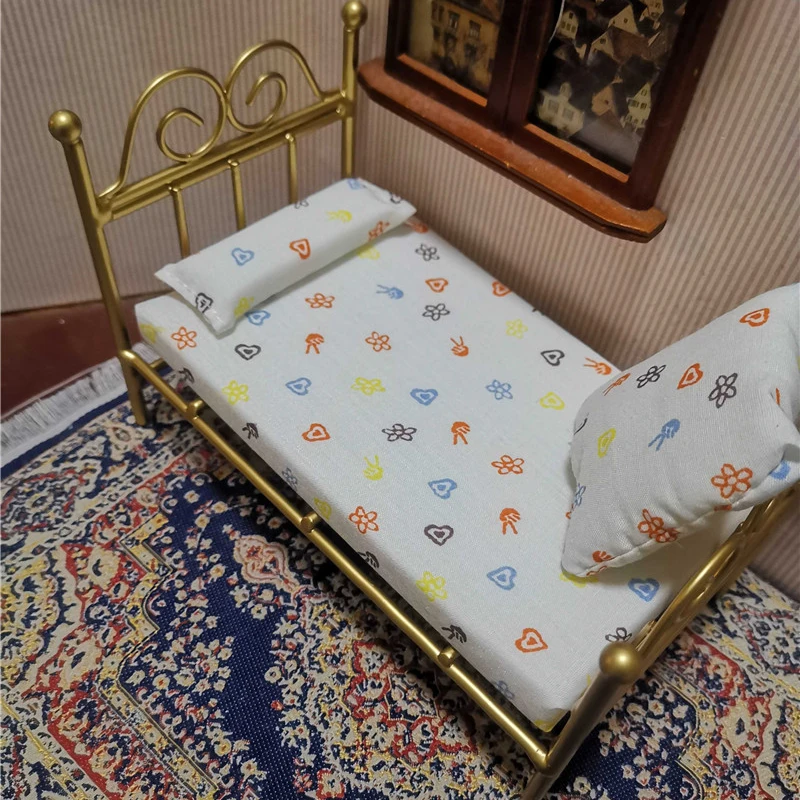 iron doll bed