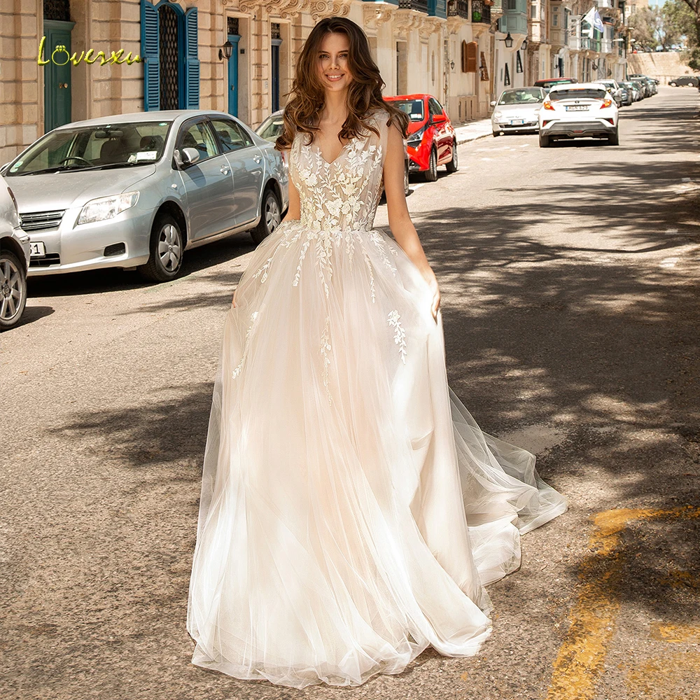 

Loverxu Chic V-Neck A Line Wedding Dresses Delicate Appliques Tank Sleeve Backless Bride Dress Sweep Train Bridal Gown Plus Size