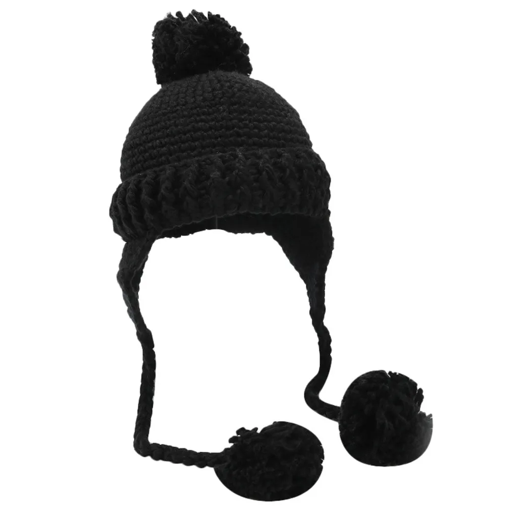 white knit hat with ear flaps