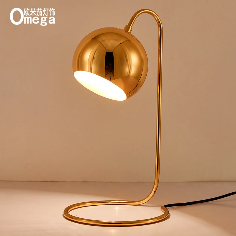 

Nordic designer creative table lamp Postmodern personality gold bedroom bedside lamp room study reading lamp