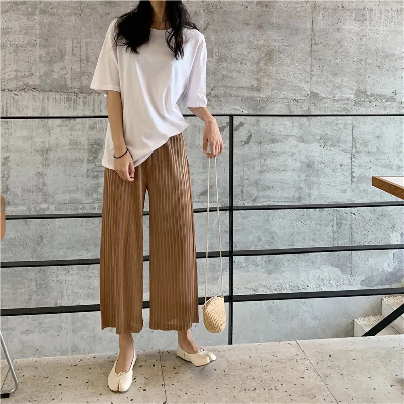 Miyake's loose slim wrinkled wide-legged pants and nine-minute pants free shipping