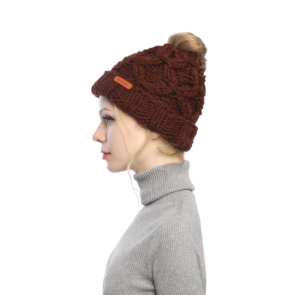 autumn and winter women's new knitted ponytail hat hair hair with an empty top hats head hats thickened to keep warm