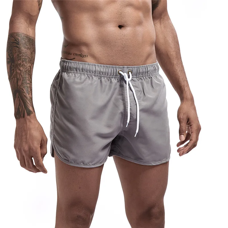 New Men Fitness Bodybuilding Shorts Man Summer Gyms Workout Male Breathable Mesh Quick Dry Sportswear Jogger Beach Short Pants