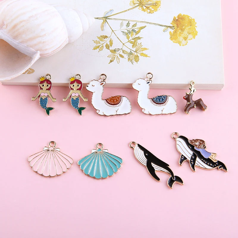 

2 pcs creative japanese and koreanalloy alpaca shark mermaid fairy skirt small pendant cartoon earrings jewelry accessories