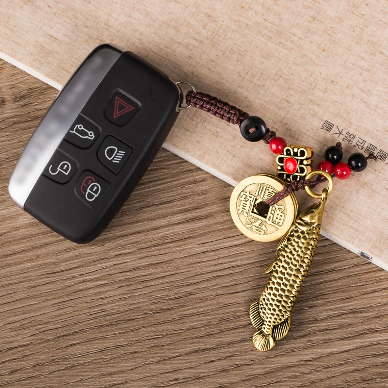 brass fish pendants (8)