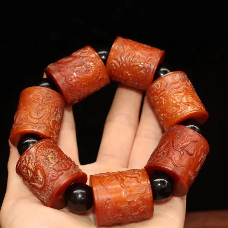 

Collection Chinese Handmade OX Horn Carving Dragon Hand String Exquisite Animal Statue Bracelet Fengshui Decoration