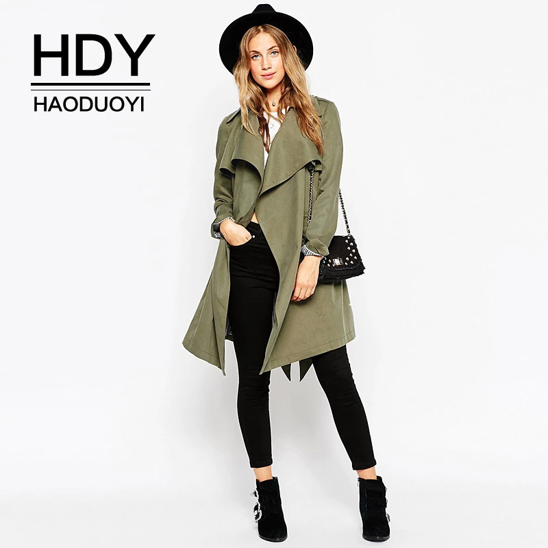 

HDY Haoduoyi Fashion Slim Lady Large Lapel Badge Design Unbuttoned Tie Waist Solid Color Long Section Autumn Windbreaker Jacket